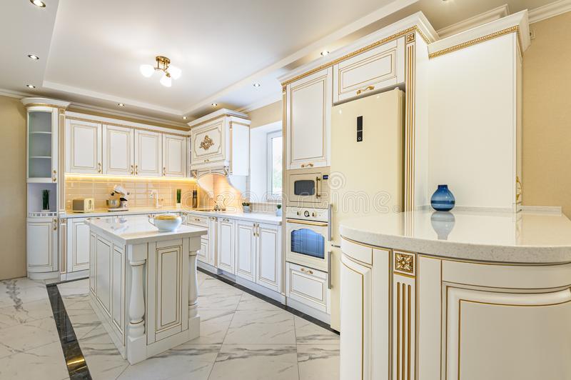 neoclassic style luxury kitchen interior island neoclassical white gold wooden home 164854505 کابینت سفید طلایی | درخششی خیره کننده با رنگ های مدرن